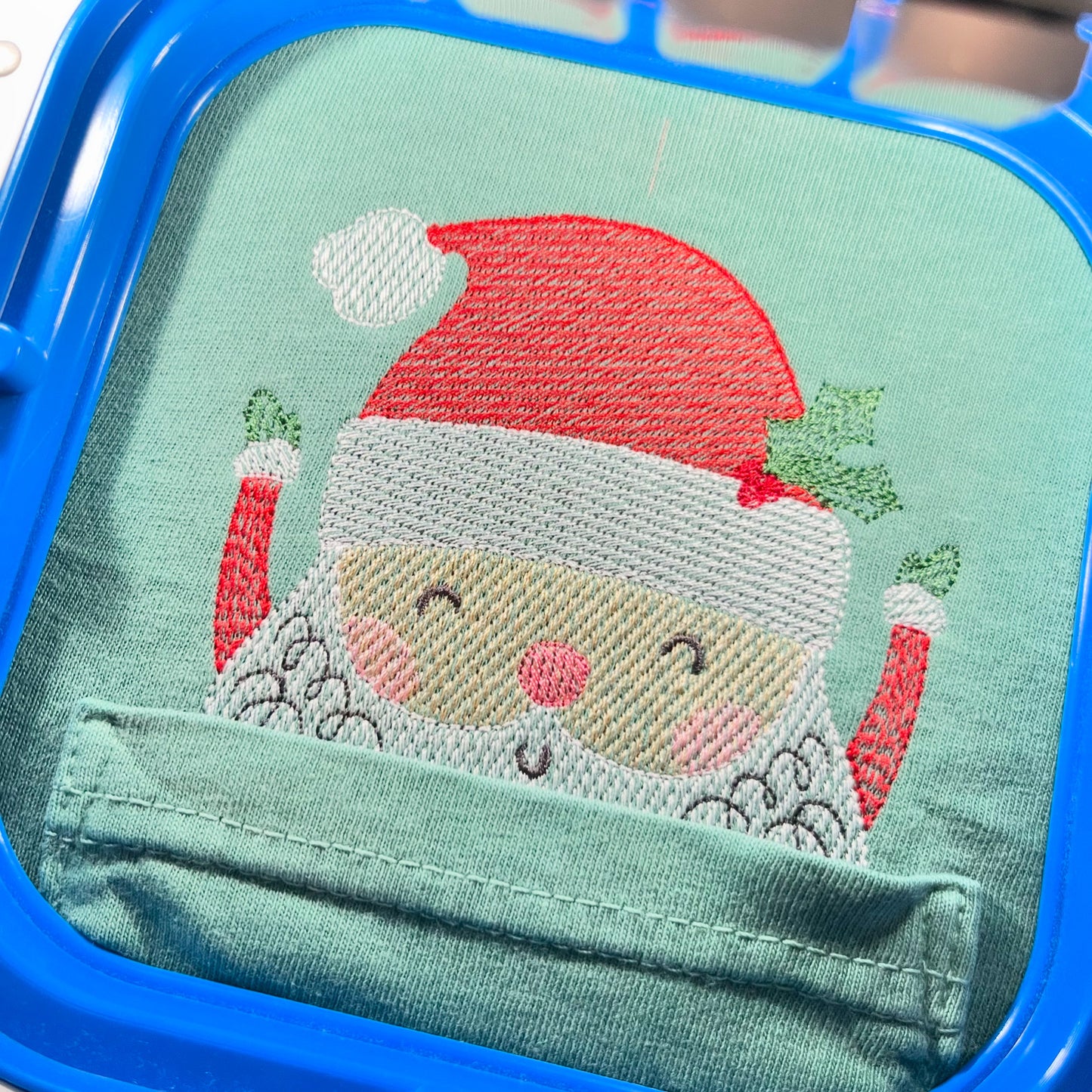 Christmas Peeking Santa Embroidered Pocket T-Shirt