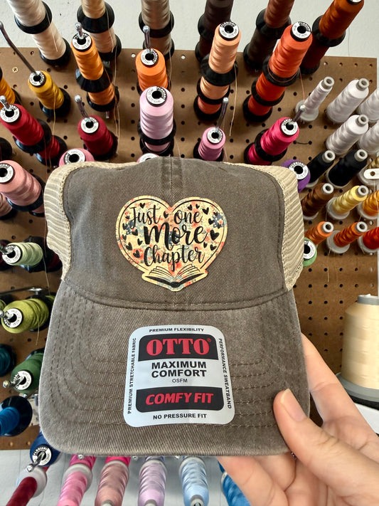 Just One More Chapter Bookish Floral Hearts Patch Brown Mesh Back Trucker Hat
