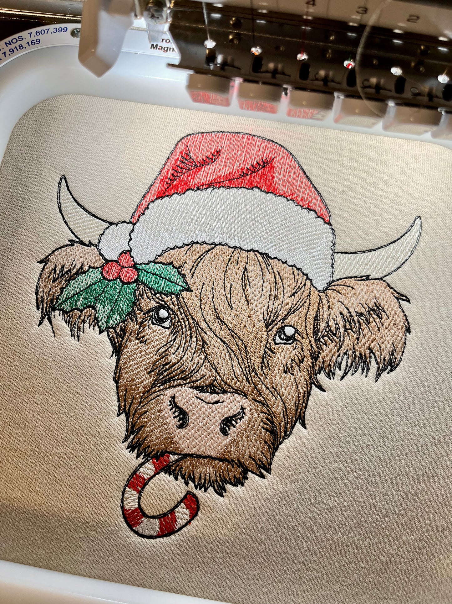 Embroidered Holiday Highland Cow Sweatshirt