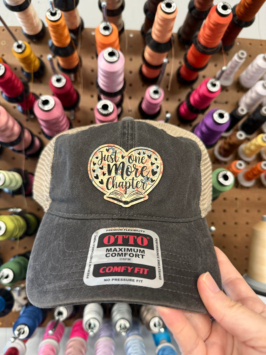 Just One More Chapter Bookish Floral Patch Washed Black Mesh Back Trucker Hat